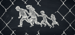 A drawing on a chalkboard of the silhouettes of a family with two young children, fleeing, with a chain link fence border