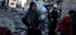 3 Women among rubble in Gaza